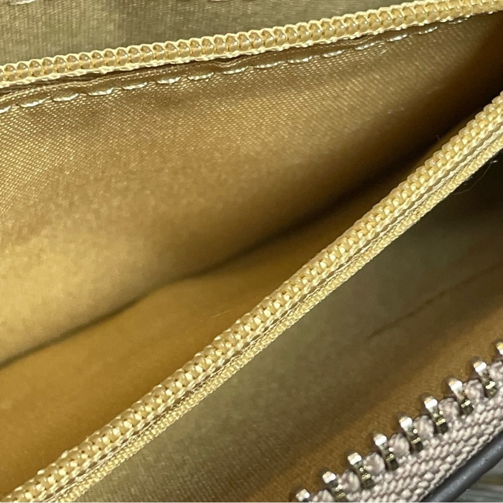 Nanette lepore Tan Clutch with Tassel Accent wristlet. Small flaw on corner - Picture 7 of 9